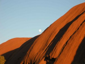 sunrise moon over uluru